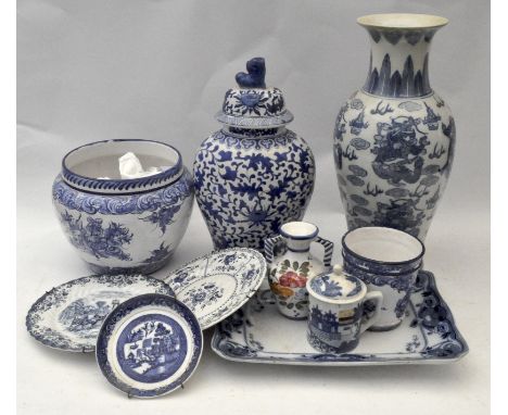 A collection of assorted blue and white china to include a Portuguese marked example, largest item 49cm