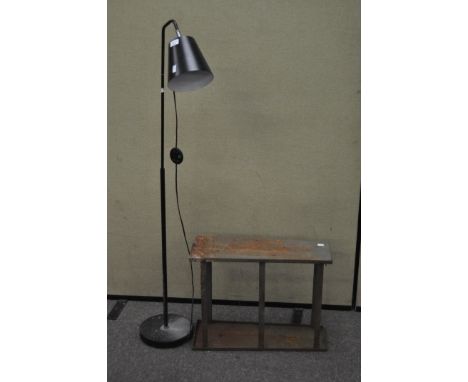 A standard lamp and a green-painted industrial metal shelving unit, the shelving  61 cm high x 46 cm wide 