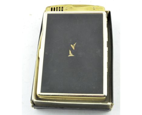 A vintage Japanese lighter and cigarette case combo, with traditional scene adorning the front depicting mount Fuji