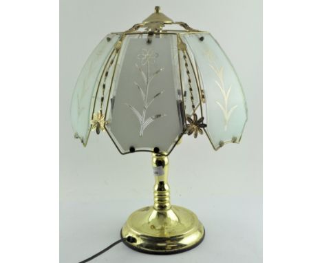 A modern gilt metal three light table lamp with opaque floral shade, 52 cm, high 