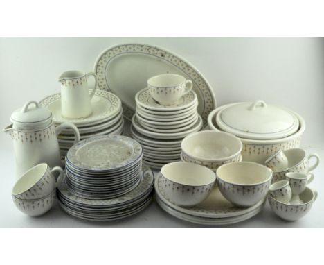 A vintage French part dinner service comprising plates, cups, platters, a lidded dish and much more. 