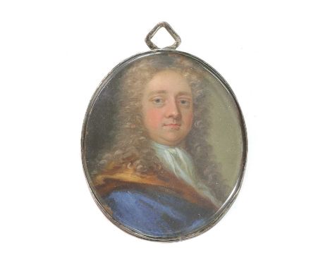 English School, early 18th centuryPortrait of a gentleman in a blue and brown coat and white stockon copper, oval4.5 x 3.5cmC