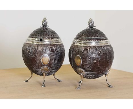 A pair of George III silver-mounted coconut tureens and covers, by Peter and Ann Bateman, London 1798,each cover with a silve