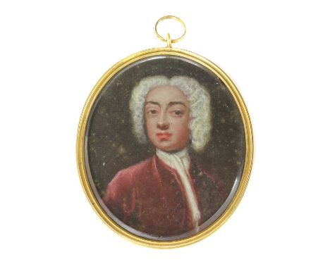 English School, c.1740Portrait of a gentleman in a red coat and white stockon card, oval7.3 x 6.2cmCondition report: Some los