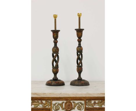 A pair of Indian papier mâché candlesticks, early 20th century, Kashmir, each with a triple helix bulbous stem, with floral d
