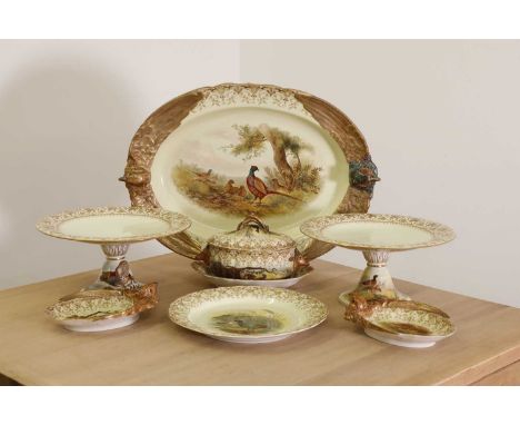A Royal Worcester vitreous porcelain game service, c.1900, comprising:12 plates,an oval serving dish,4 comports,a pair of ova