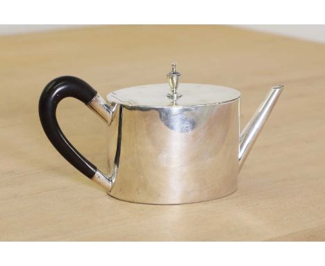 A George III silver miniature journeyman's or saffron teapot,London 1781,of plain oval form with a flush hinged cover, applie