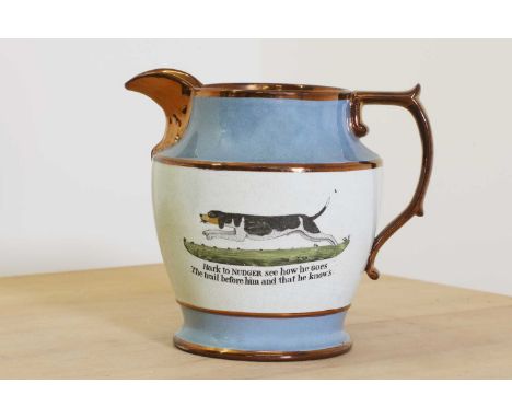 A Staffordshire pottery pitcher,early 19th century, with an image of the famous sporting dog 'Nudger' with an inscription bel