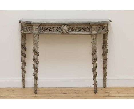 A Louis XVI painted console table,late 18th century, French, the shaped grey marble top above an elaborate foliate-detailed p