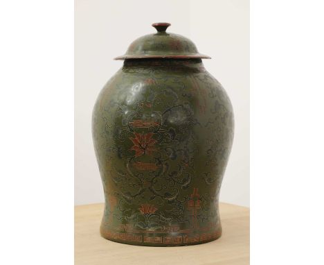 A green-lacquered papier-mâché vase and cover, c.1900, Chinese, decorated with scrolling foliage and flowers,40cm high (2)Con