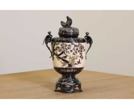 A Japanese Shibayama ivory and silver vase and cover,Meiji period (late 19th century), the two handles as birds, with plain a