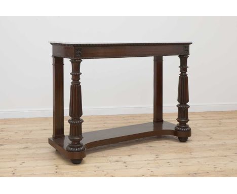 A rosewood console table,early to mid 19th century, the marble top over a single drawer, raised and turned on column supports