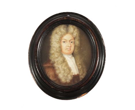 English School, early 18th century Portrait of a gentleman in a russet coat and white stockindistinctly inscribed 'This is th