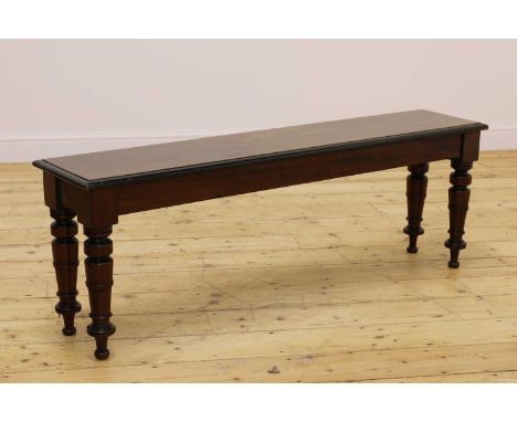 A Victorian hall bench,19th century, the rectangular top raised on turned tapering legs,138cm wide30cm deep47cm high Conditio