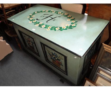 A LARGE PAINTED TOY TRUNK with panelled front, 24" deep x 48" wide