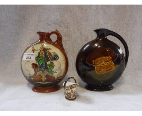 A ROYAL DOULTON DEWAR'S WHISKY FLASK, one other Whisky flask and a Royal Crown Derby miniature coal scuttle (3)