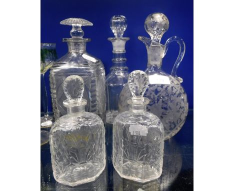 A GEORGIAN CUT-GLASS DECANTER, an acid etched claret jug with a parrot within thistles and vines and three other decanters (5