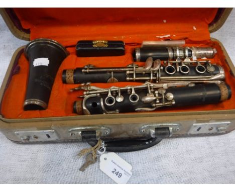 A CONSOLE STEEL EBONISED SELMER CLARINET in original fitted case