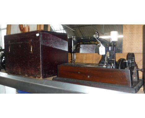 A VINTAGE 'WHEELER & WILSON' SEWING MACHINE with case