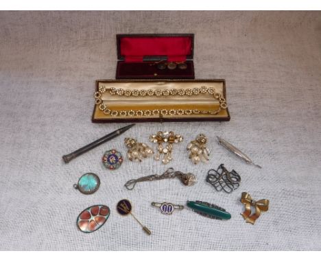 CHRISTIAN DIOR: A VINTAGE PASTE SET BROOCH, a Stirling Silver scroll brooch, a marcasite silver and turquoise stone brooch an