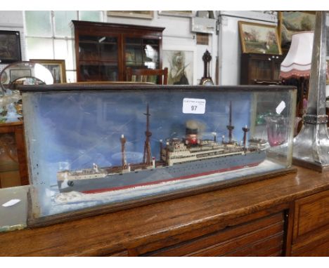 A VINTAGE SCRATCH BUILT MODEL OF A STEAM MAIL SHIP in a glazed case, 6.5" high x 18" wide (overall)