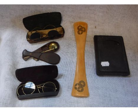 A CHINESE INK BLOCK in wooden stand, an ivory paperweight, two pairs of antique spectacles and a pair of scales