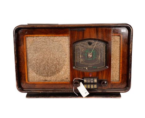 An Art Deco Philips walnut cased radio, model 66A/U, wired for Bluetooth, 56cms wide.