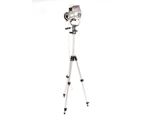 Strand Electric: a vintage polished steel theatre spotlight on modern manfrotto tripod stand, 32 x 179cms high.