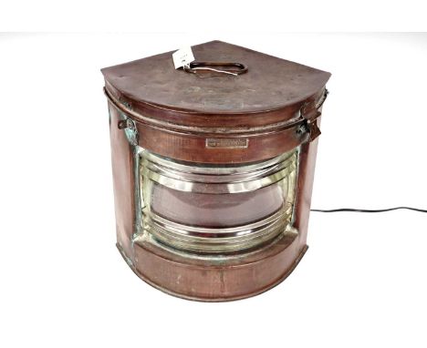 A copper ships light, later converted to a table lamp, wired for electricity, 36 x 35cms high.