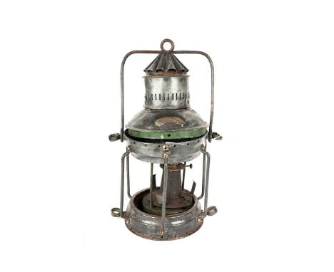The ‘Maritime’ white metal and brass mounted ships lantern, lacking glass shade, 54cms high.