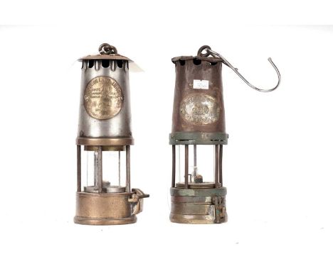 A white metal and brass miners safety lamp, by W.E. Teale &amp; Co Ltd, Swinton, Lanc., with unassociated white metal hook ha