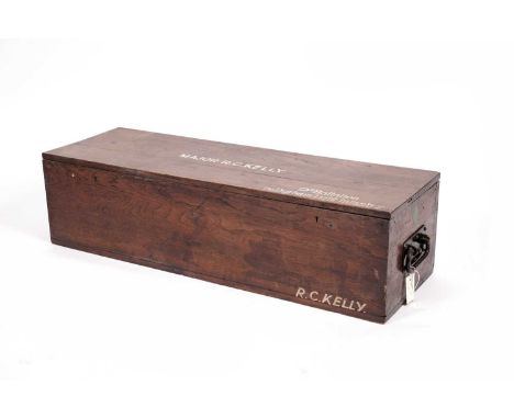 Early 20th Century stained wood trench trunk, rectangular form, the hinged cover with inscription Major R.C. Kelly/ 9th Batta