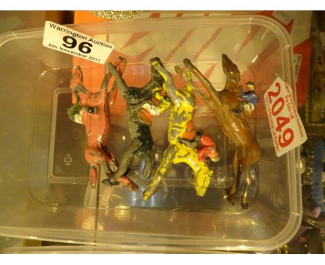 Four Chad Valley cast metal race horses with jockeys