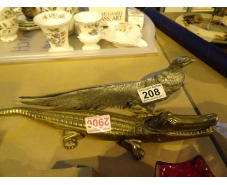 Silver plated pheasant and a brass crocodile nut cracker