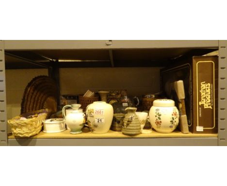 Shelf of mixed items including jugs and a barometer