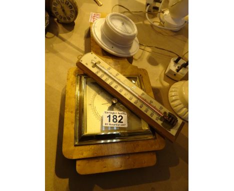 Walnut barometer thermometer and two others