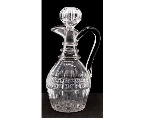 A 19th Century glass decanter and stopper, circa 1820-40, of mallet shape with strap handle and onion stopper, the three-ring