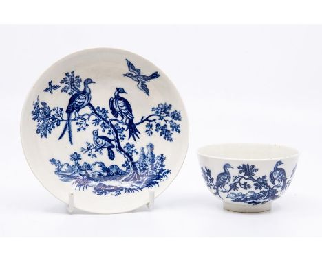 A Worcester teabowl and saucer, circa 1770-90, printed in blue with the 'Birds in Branches' pattern, saucer 12cm dia. (2)