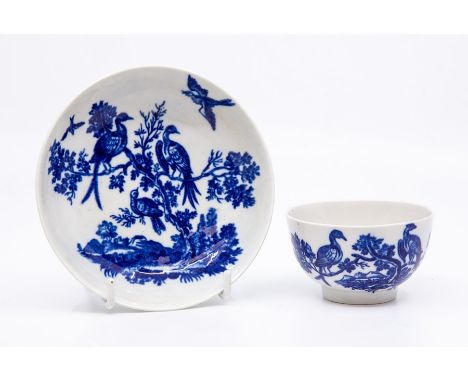 A Worcester teabowl and saucer, printed in blue with the 'Birds in Branches' pattern, saucer 12cm dia.
