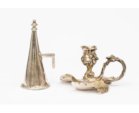 A silver plated chamber stick, the leaf-form base with vine handle and fruiting nozzle, 5cm, together with a white metal cand