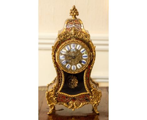 A French Louis XV style boulle mantel or desk clock, late 19th Century, with blue enamel chapters, the Japy Freres eight-day 