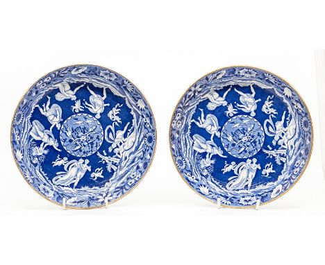 A pair of Spode blue and white saucer dishes, circa 1825-35, of plain rounded form and decorated with 'The Love Chase' patter