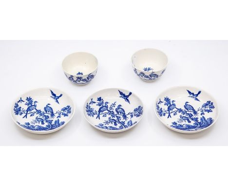 Two Worcester teabowls and saucers, circa 1770-90, decorated with the 'Birds in Branches' pattern, together with another simi