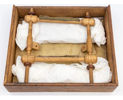 The Little Embroiderer oak boxed embroidery set, containing a self assembly embroiderers frame, made from turned boxwood, the