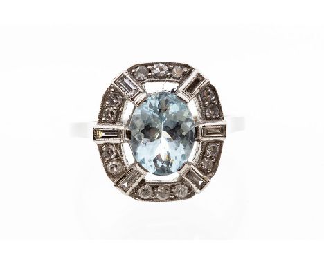 An aquamarine and diamond platinum ring, the oval cut claw set aquamarine measuring approx. 8.9mm x 6.2mm x 4.7mm, carat weig