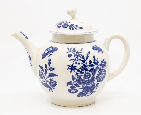 A Worcester teapot and cover, circa 1770-80, of globular form with ribbed loop handle and flower finial, printed in blue with