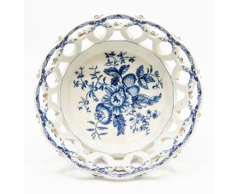 A Worcester chestnut basket, circa 1770-90, of circular form, the sides pierced with interlocking rings and applied with flor