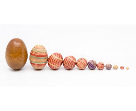 A late Victorian/Edwardian treen plaid decorated egg-shaped sewing companion, marked M'Duff, the interior with bobbin or thim