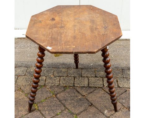 An Edwardian mahogany cross-banded pembroke table, the plain top with 'D' shape drop leaves cross-banded and ebony strung, ra