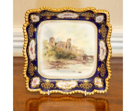 A Royal Worcester dish by James Stinton, dated 1911, of lobed square form with gadrooned rim, painted with a scene of Barnard